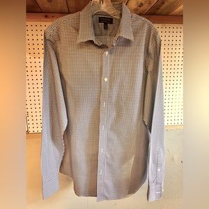 Blue and white long sleeve, checkered, casual dress shirt, size large.